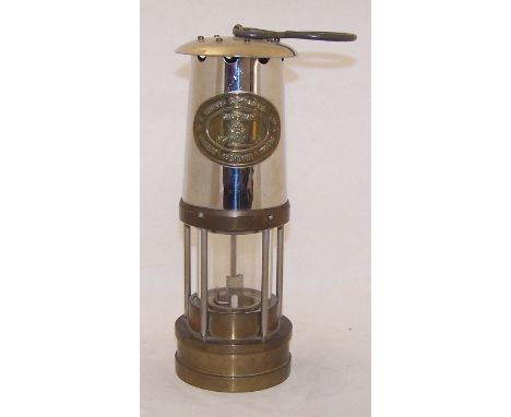 A Miner's Safety Lamp by E Thomas & Williams Ltd.