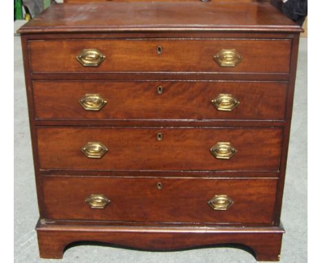 An early 19th century mahogany Chest of four long graduated drawers with brass handles, and on bracket feet, 2' 9" (84cms) wi