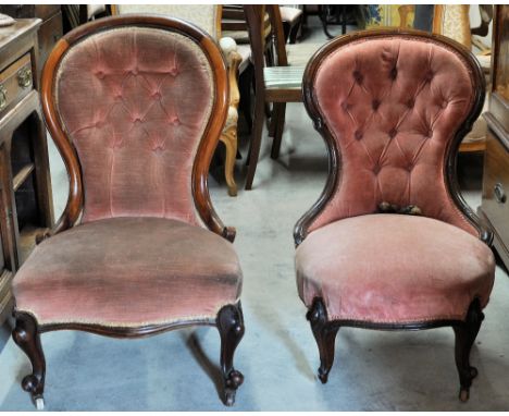 A Victorian mahogany frame spoon back Drawing Room Chair with button upholstered back and circular seat on cabriole supports.