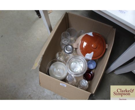 A box containing various glassware to include decanters and stoppers; glass flask; glass vases; pint glasses etc