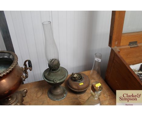 An oil lamp together with an oil lamp base