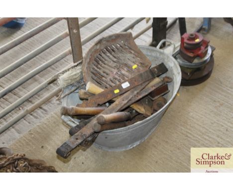A galvanised twin handled bath and contents of various hand tools to include wooden plane