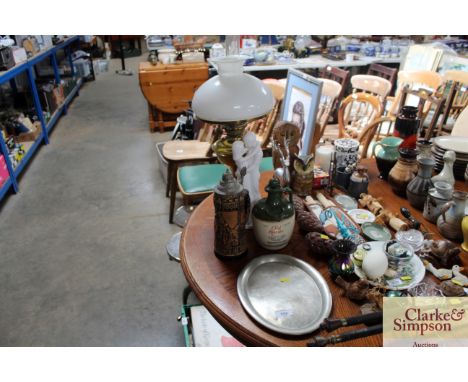 A brass oil lamp, a Spode figure, a coffee pot, a pewter tray, an English Whisky jug