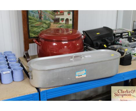 An enamel cooking dish and fish kettle