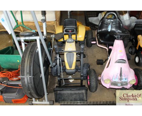 A child's pedal tractor