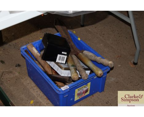 A box containing a portable navigation device together with various hand tools