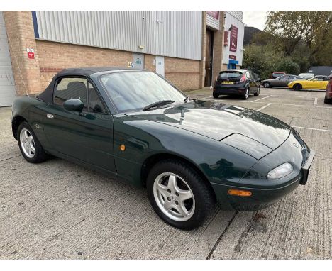 1997 Mazda MX-5 Monza, 1598cc, manual, 2 door convertible, reg. no. R322 BTU, finished in British Racing Green with a black c
