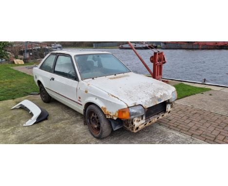 1988 Ford Escort XR3i, 1,597cc. Registration number E53 EAR. Chassis number SFABXXBBABJB32810. Engine number JB32810. Partly 