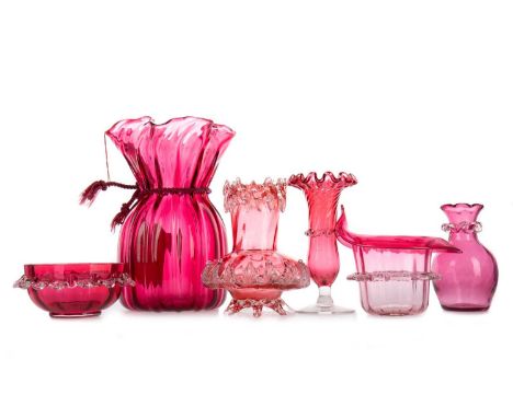 COLLECTION OF VICTORIAN CRANBERRY GLASS, comprising seven vases, four wine glasses, two jugs, two tumblers, a bowl, and a fla