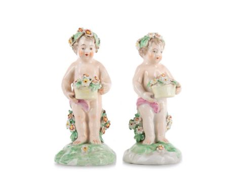 PAIR OF DERBY FIGURES OF BOYS, 18TH CENTURY  patch marks to base and incised No511cm high