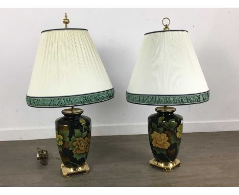 PAIR OF MODERN CERAMIC VASE LAMPS, each with baluster body transfer decorated with foliage, on brass square base to bracket f