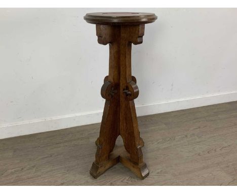 OAK GOTHIC REFORM JARDINIERE STAND, LATE 19TH / EARLY 20TH CENTURY the moulded circular top on four shaped and tapered uprigh