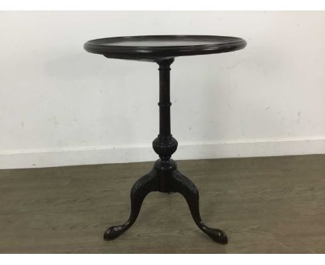 MAHOGANY CIRCULAR TRIPOD TEA TABLE, of Chippendale design, the dished top over a ring turned column to cabriole supports47cm 