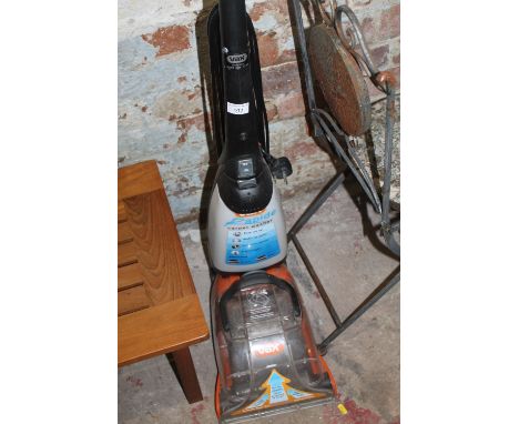 A VAX UPRIGHT CARPET WASHER
