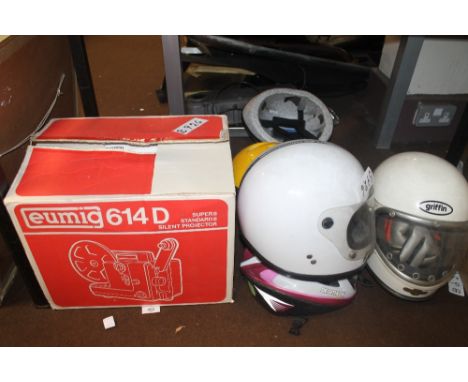 A EUMIG PROJECTOR TOGETHER WITH A QUANTITY OF ASSORTED HELMETS ETC.