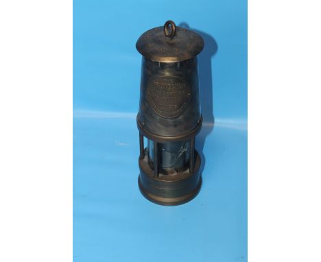 A VINTAGE MINER'S LAMP