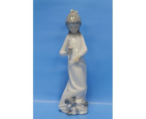 A NAO FIGURINE OF A GIRL