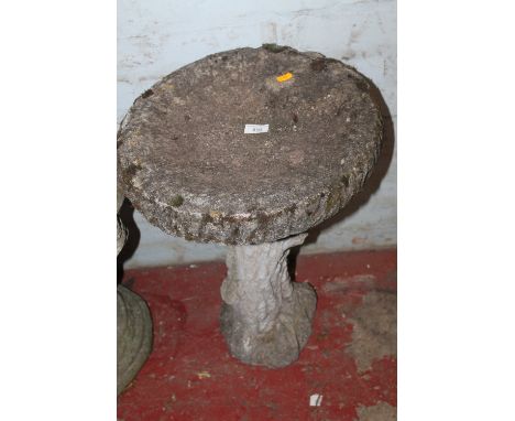 A STONE GARDEN BIRDBATH