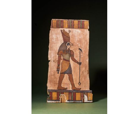 Late Period, Ca. 664 - 30 BC An Egyptian, late period, wooden panel with a painted design of Horus with a double crown (white