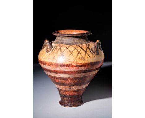 Ca. 1400 - 1300 BCAn elegant wheel-thrown Mycenaean pottery jar known as a pithos with a petite discoid base which gradually 