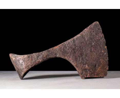 Ca. AD 800 - 1100A Viking iron bearded axe head with a heavy sharp blade and a socket reinforced to accommodate the hardwood 