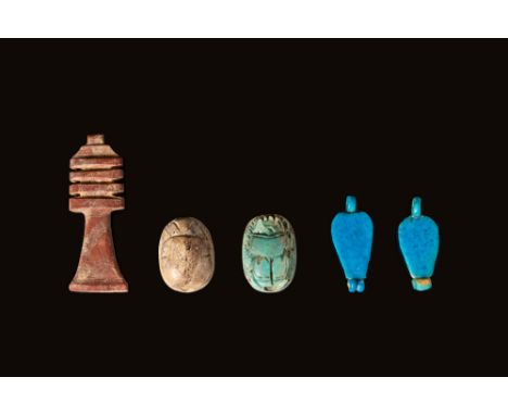 New Kingdom - Late Period, Ca. 1700 - 332 BCAn ensemble of five carved stone and faience amulets. First on the left is a jasp
