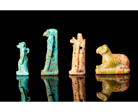 New Kingdom - Late Period, Ca. 1550 - 332 BCAn Egyptian group of 4 mould-formed faience amulets covered in lustrous layers of