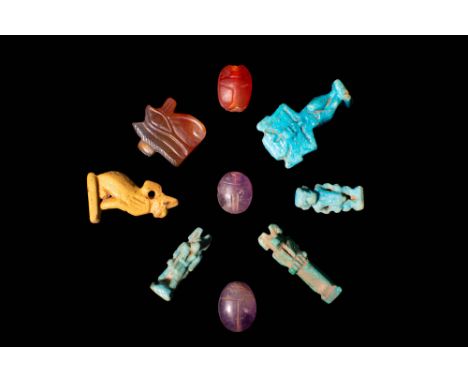 Third Intermediate Period - Late Period, Ca. 1069 - 332 BCAn group of nine mould-formed faience amulets covered in lustrous l