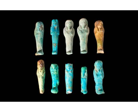 Late Period - Ptolemaic Period, Ca. 664 - 30 BCA group of Egyptian faience ushabti. These ten figures are depicted in a mummi