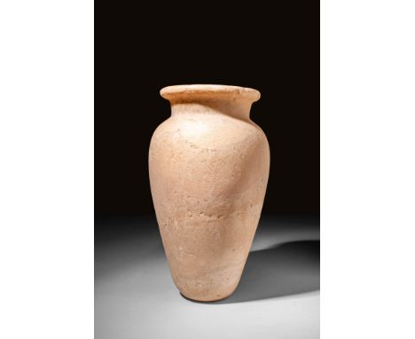 Old Kingdom, Ca. 2620 - 2184 BCAn Egyptian alabaster offering jar expertly hand-carved from honey-yellow alabaster. The top-h