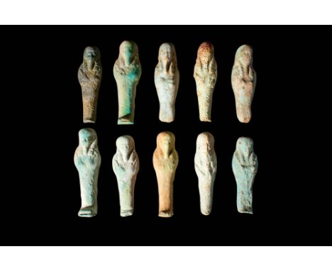 Late Period - Ptolemaic Period, Ca. 664 - 30 BCA group of Egyptian faience ushabti. These ten figures are depicted in a mummi