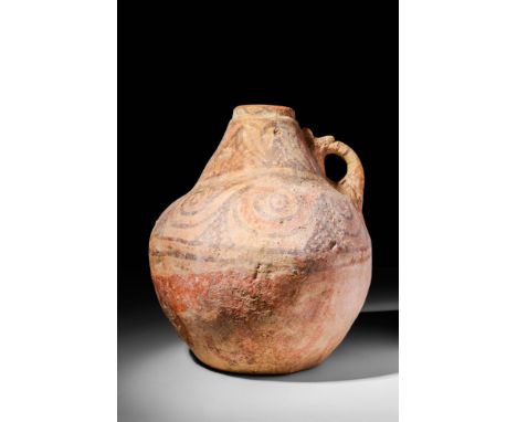 Ca. 2000 - 1000 BCA hand-made Bactrian pottery jug of attractive form with a large globular body connected to a short neck ri