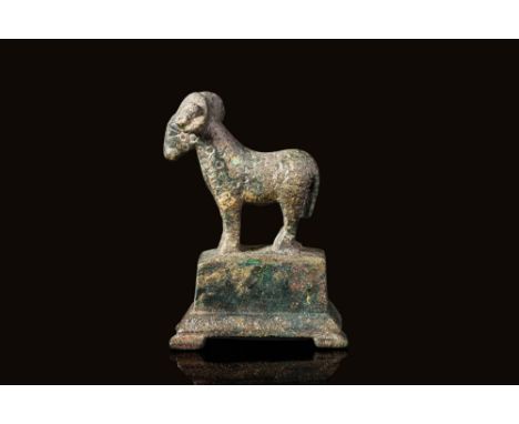 Ca. AD 100 - 300An ancient Roman bronze figurine of a ram, detailed to show the features of the eyes, horns, tail and limbs. 