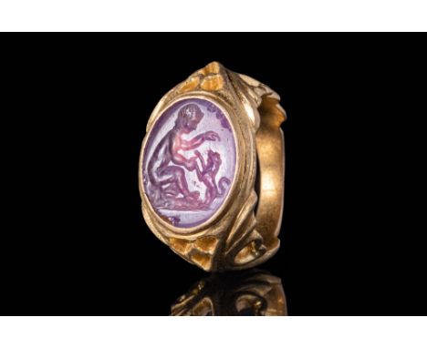 Ca. AD 200 - 400A Roman open work gold ring with a round embellished hoop and a double palmette motif flanked by two hearts. 