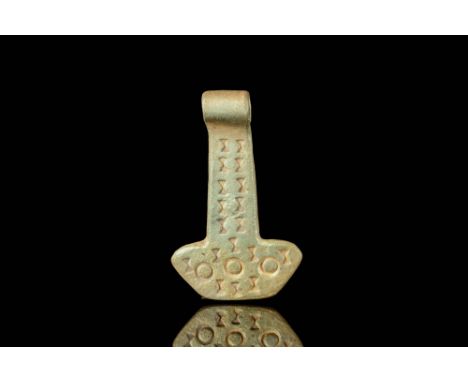 Ca. AD 800 - 1100A Viking pendant depicting Mjolnir, the legendary hammer wielded by the Norse god of thunder Thor. The hamme