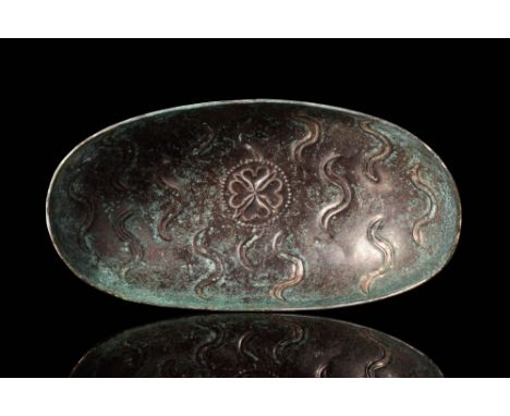 Ca. AD 200 - 400A finely hammered Late Sasanian boat-shaped silver bowl, featuring a smooth, curvy contour that is accentuate