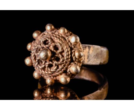 Ca. AD 700 - 900A Byzantine silver gold dome ring with round hoo with flat section connected to an openwork dome shaped bezel