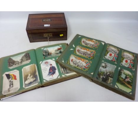 Rosewood work box inlaid with mother of pearl and two albums of Victorian and later postcards  Condition Report Click here fo