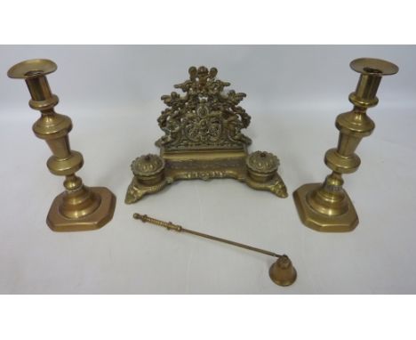 Ornate brass inkwell, two brass candle sticks and a brass candle snuffer  Condition Report Click here for further images, con