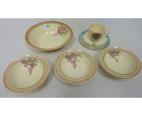 Clarice Cliff 1953 Coronation cup, plate and saucer and a Clarice Cliff, Wilkinson Ltd seven piece fruit set  Condition Repor