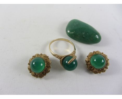 Jade 9ct gold ring Birmingham 1967, similar pair ear-rings Sheffield 1979 and a jade stone Condition Report Click here for fu