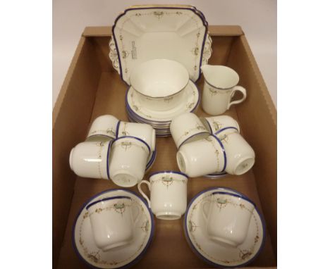 Shelley 11422 tea service decorated with floral sprays, blue and gilt rim, comprising 11 cups and 12 saucers, 10 side plates,