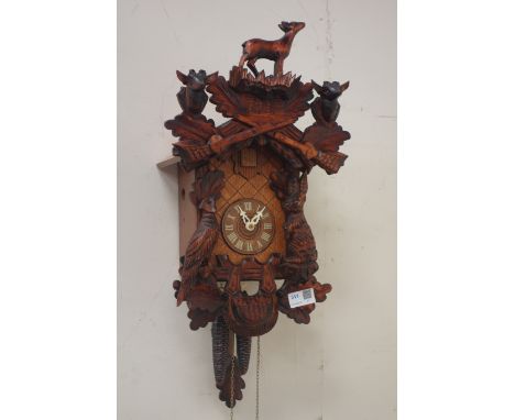 German wall hanging cuckoo clock, carved hunting scenes, H44cm  CLOCKS & BAROMETERS - as we are not a retailer, these items a