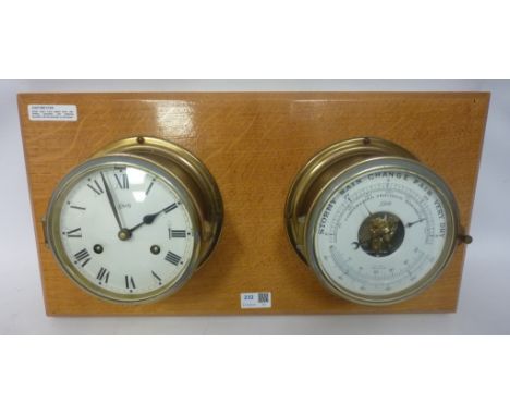Schatz ship's brass plated clock with striking movement and matching barometer with thermometer on oak plaque Condition Repor