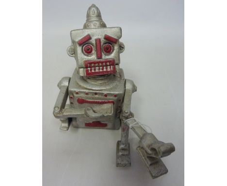 Cast iron robot money box, 'Robert the Robot' 1950, H 18cm  Condition Report Click here for further images, condition, auctio