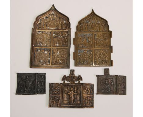 A Russian Orthodox brass triptych icon, in relief with scenes from the life of St Nicholas of Mozhaisk, 9.5cm high; others, s