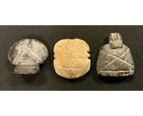 Antiquities - Egyptian late period 644-332BC, dark stone amulet tablet, as an apron, carved crossed body, representative of b