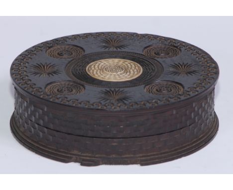 An early 19th century engine turned lignum vitae table snuff box, the push-fitting cover centred by a bone roundel, enclosing