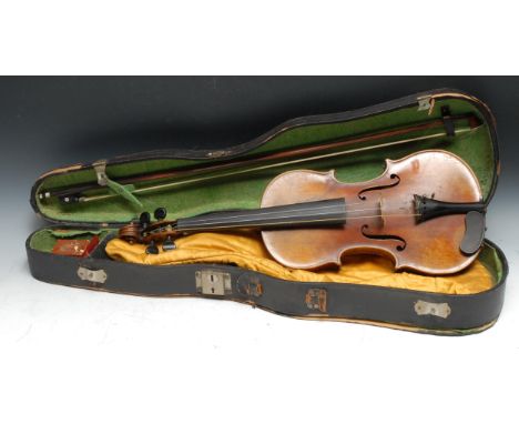 A violin, the two-piece back 35.75cm long excluding button, paper label Straduarius Cremonensis Faciebat Anno 1730, stamped t