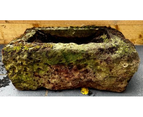 A stone trough, 22cm high, 53cm wide, 31cm deep 